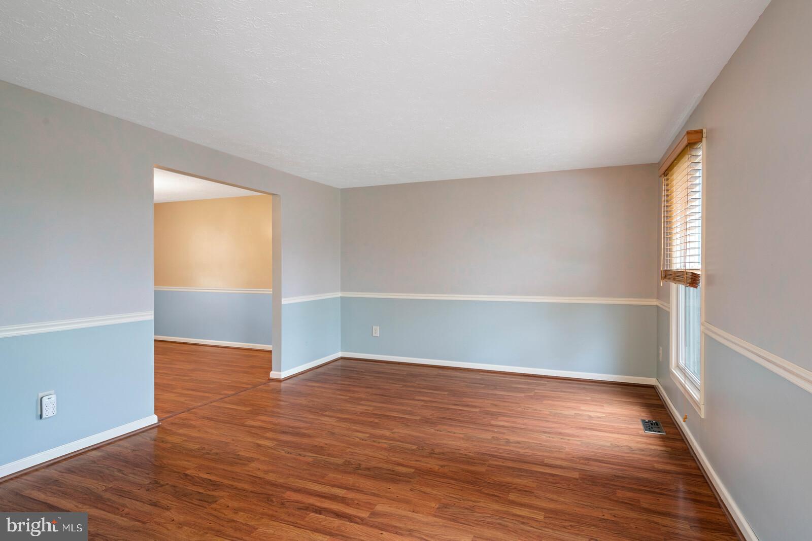 7514 Candytuft Court Springfield, VA 22153 - Photo 12 of 43 Dining area with chair rail molding