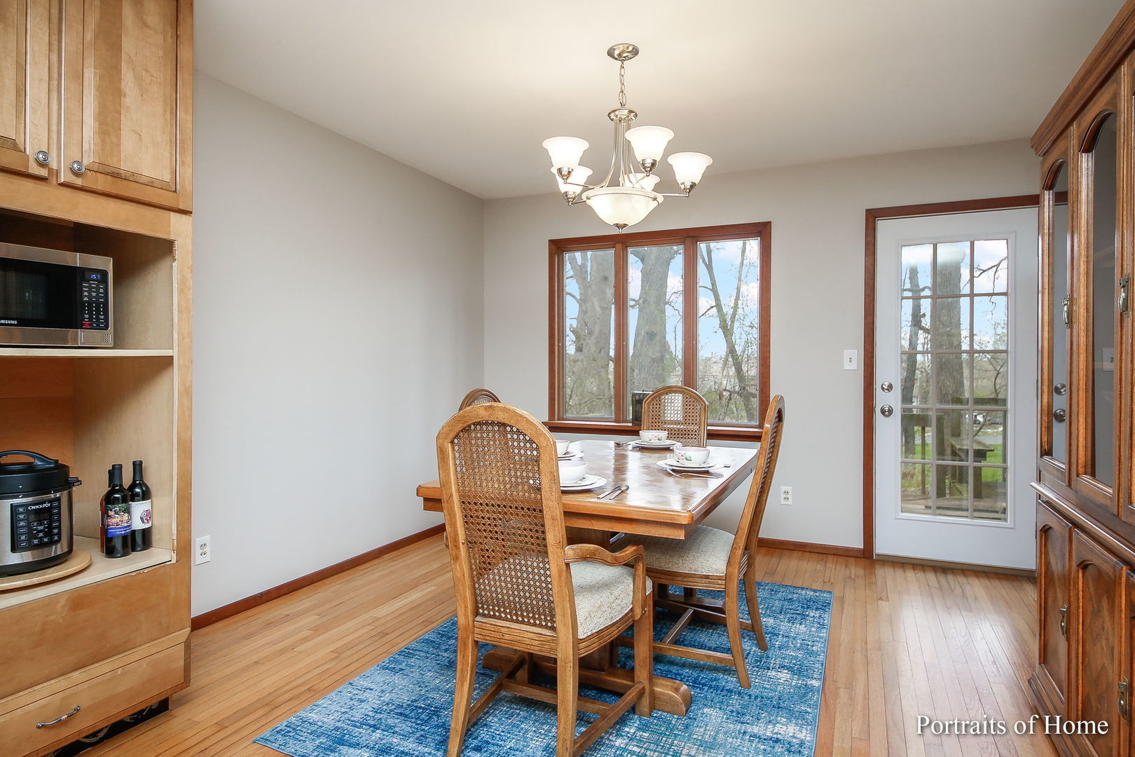 4S785 Norris Road Sugar Grove, IL 60554 - Photo 13 of 31 a view of a dining room with furniture window and wooden floor