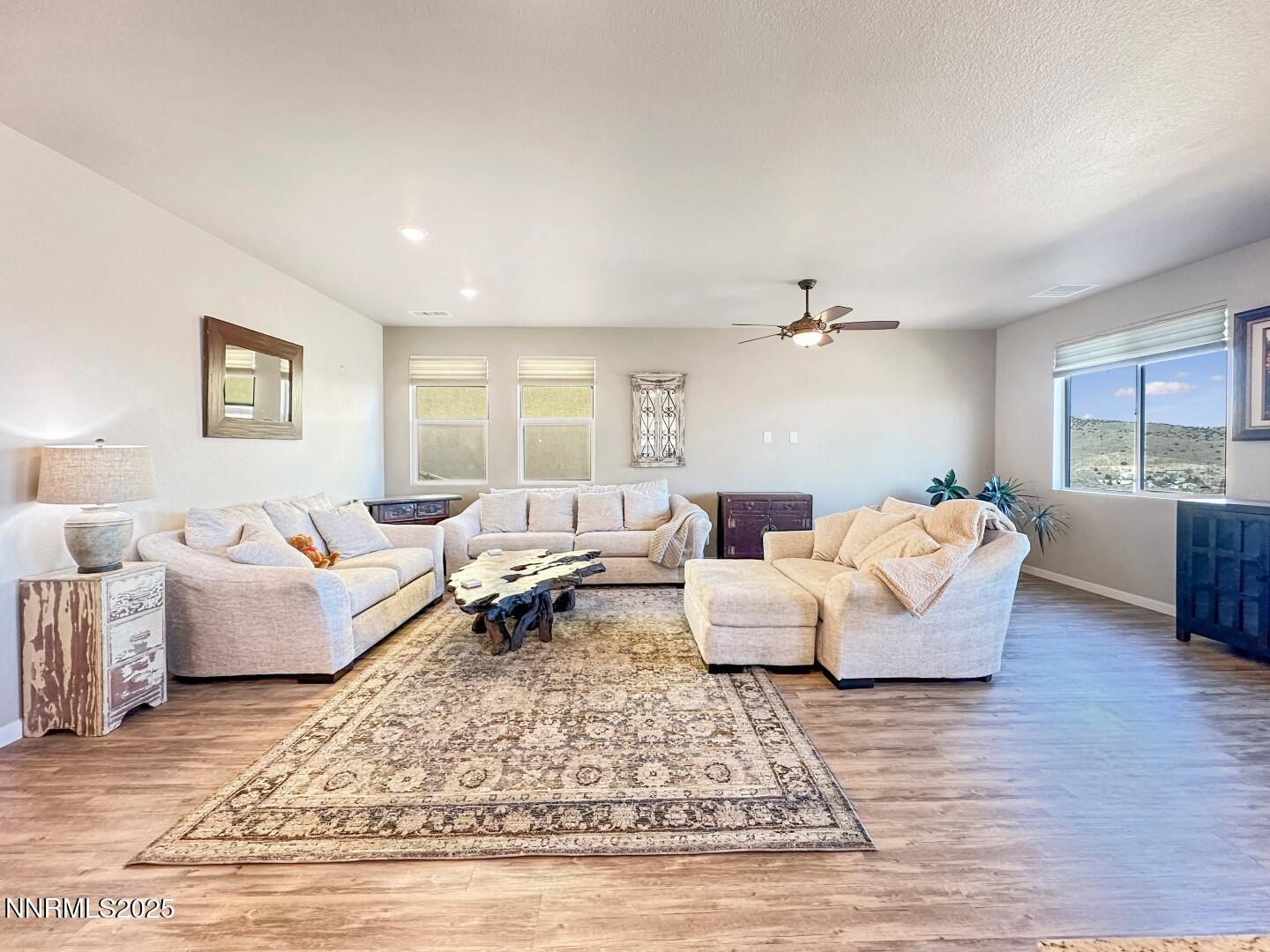 2015 Painted Sky Way Sun Valley, NV 89433 - Photo 13 of 31 a living room with furniture and a couch