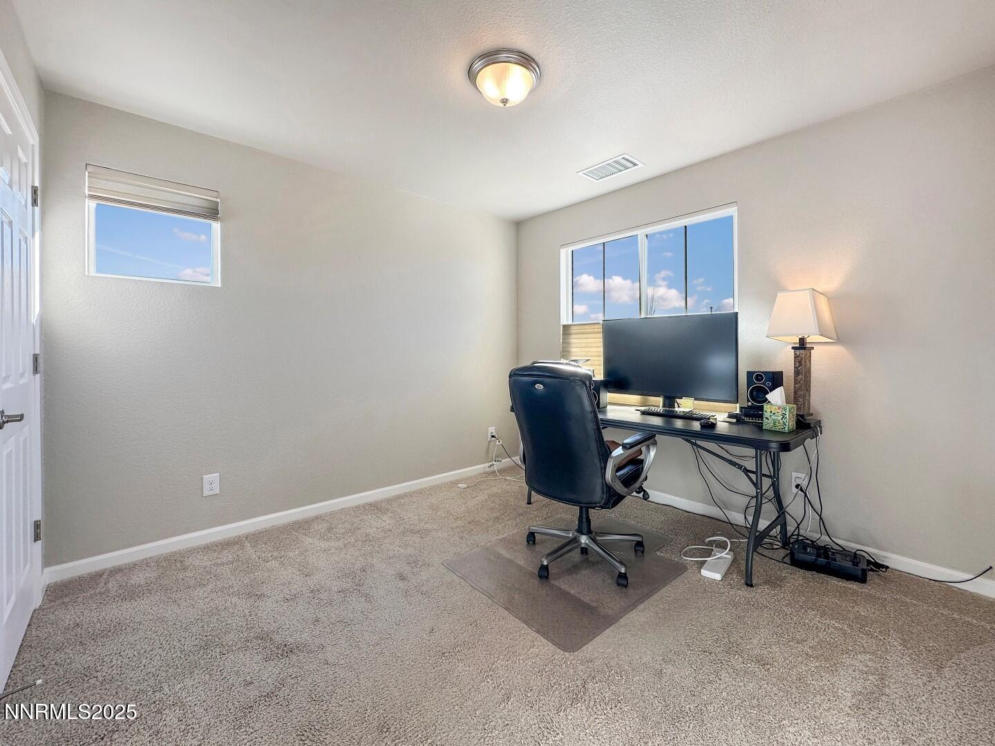 2015 Painted Sky Way Sun Valley, NV 89433 - Photo 29 of 31 a view of a workspace with furniture