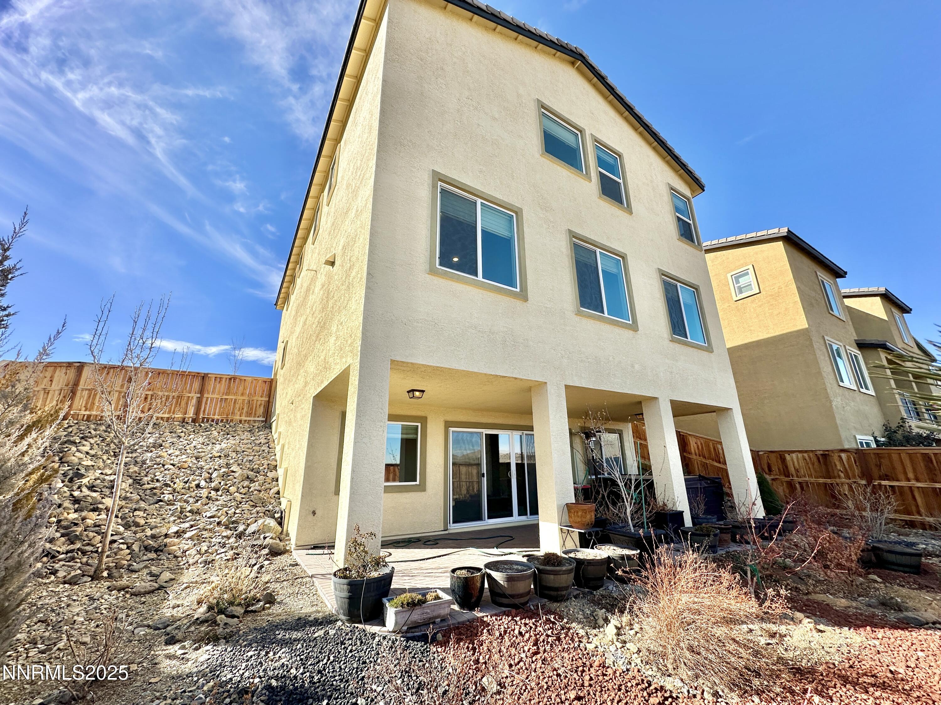 2015 Painted Sky Way Sun Valley, NV 89433 - Photo 31 of 31 a front view of a building with street view
