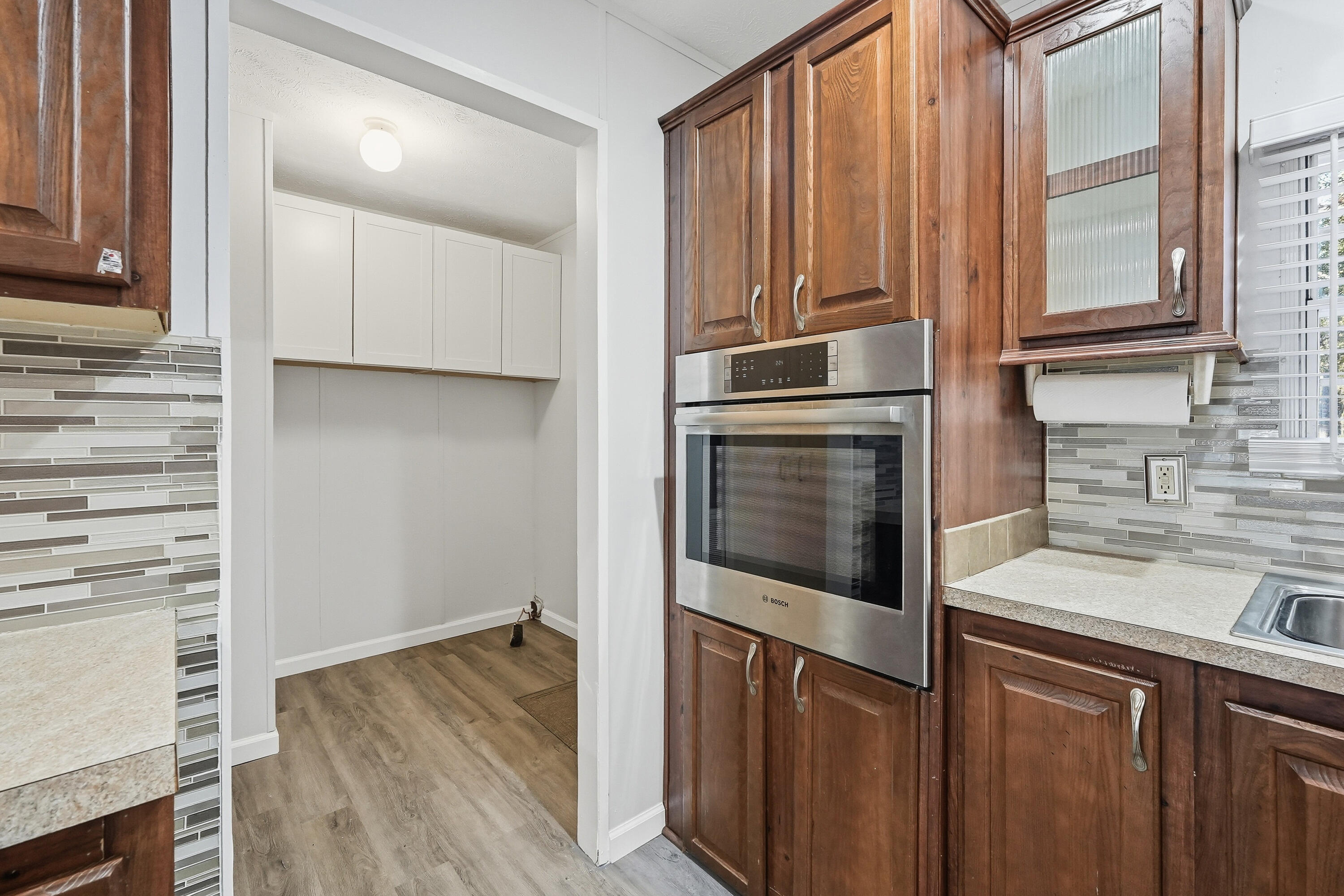 482 Roberts Road East DeFuniak Springs, FL 32433 - Photo 15 of 61 a kitchen with stainless steel appliances granite countertop a refrigerator sink and cabinets