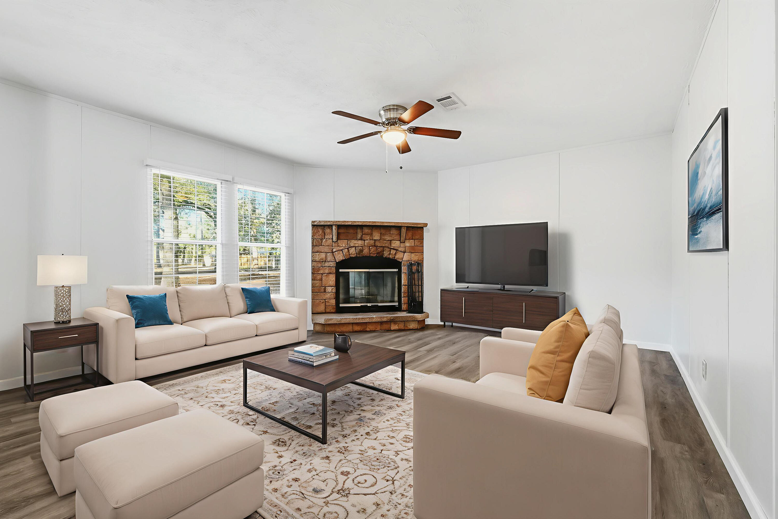 482 Roberts Road East DeFuniak Springs, FL 32433 - Photo 25 of 61 a living room with furniture and a fireplace