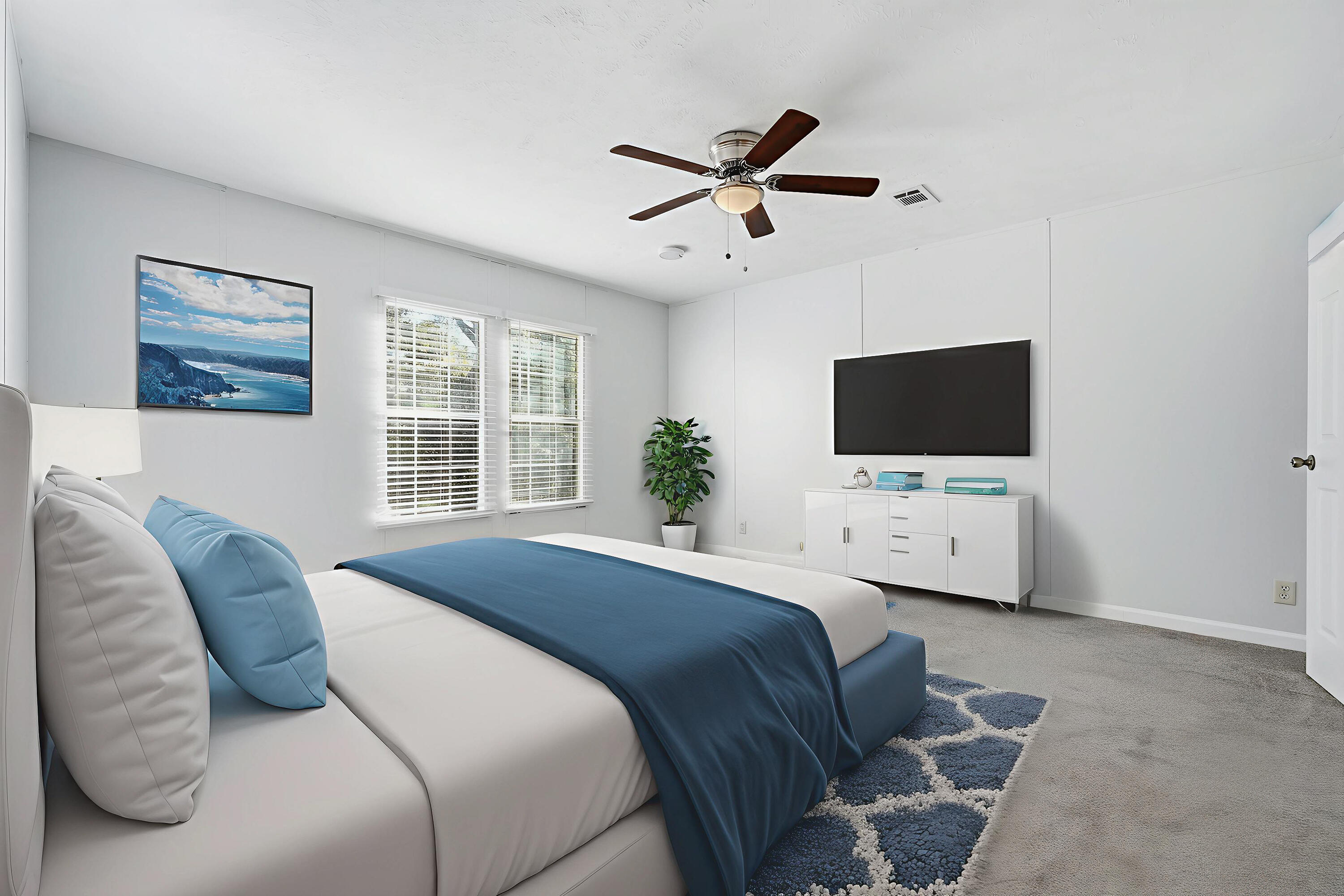 482 Roberts Road East DeFuniak Springs, FL 32433 - Photo 32 of 61 a bedroom with a bed tv and a window