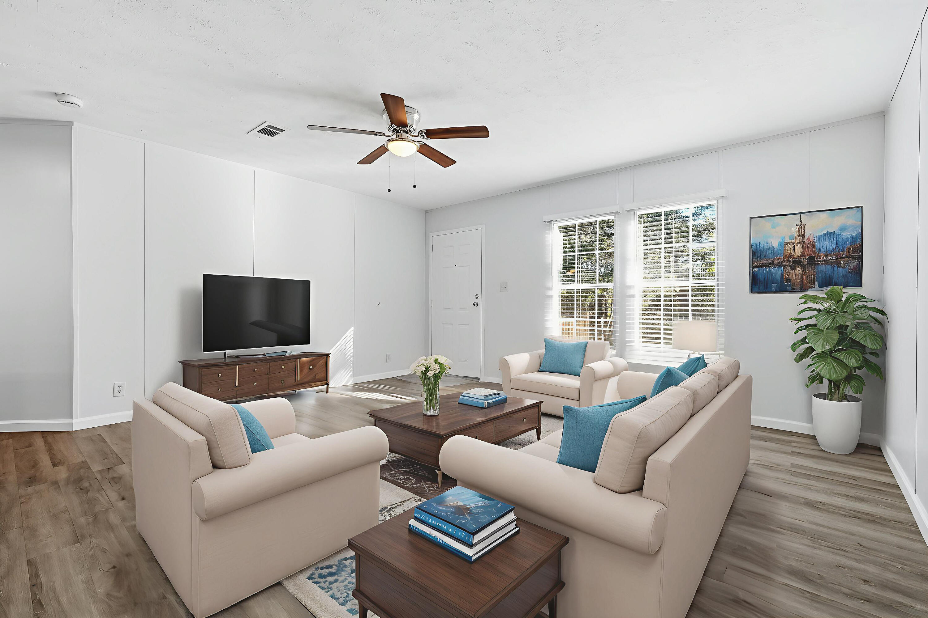 482 Roberts Road East DeFuniak Springs, FL 32433 - Photo 4 of 61 a living room with furniture and a flat screen tv
