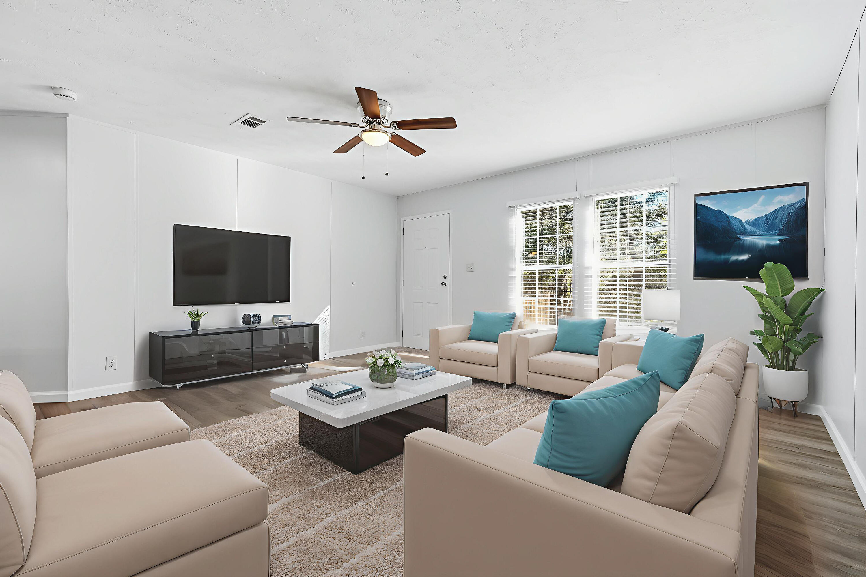 482 Roberts Road East DeFuniak Springs, FL 32433 - Photo 5 of 61 a living room with furniture and a flat screen tv