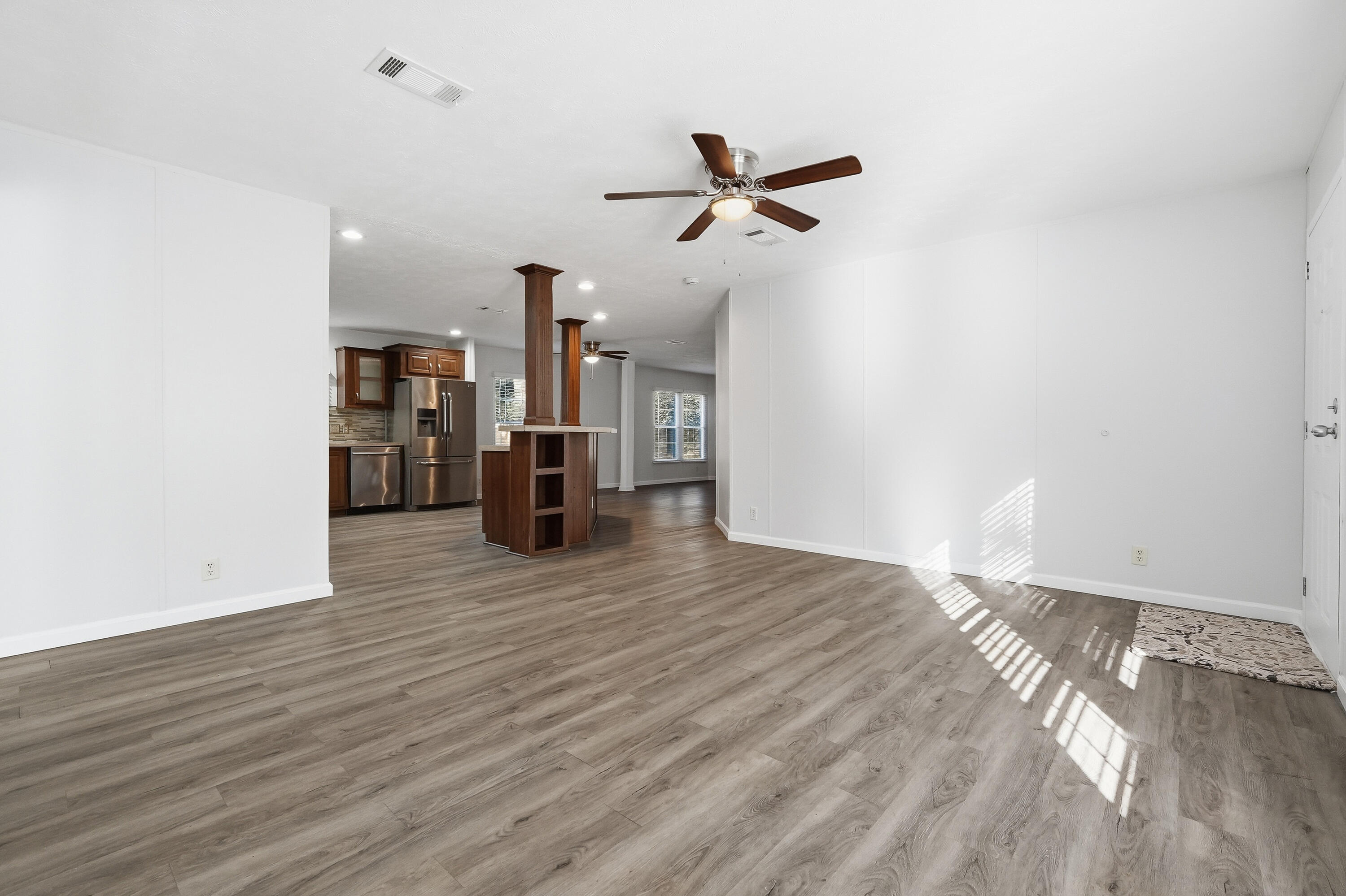482 Roberts Road East DeFuniak Springs, FL 32433 - Photo 9 of 61 a view of empty room with wooden floor