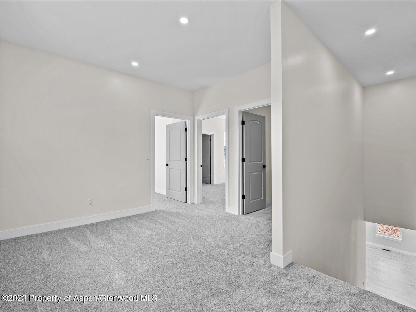 1416 Rifle Heights Drive Rifle, CO 81650 - Photo 25 of 35 a view of an empty room