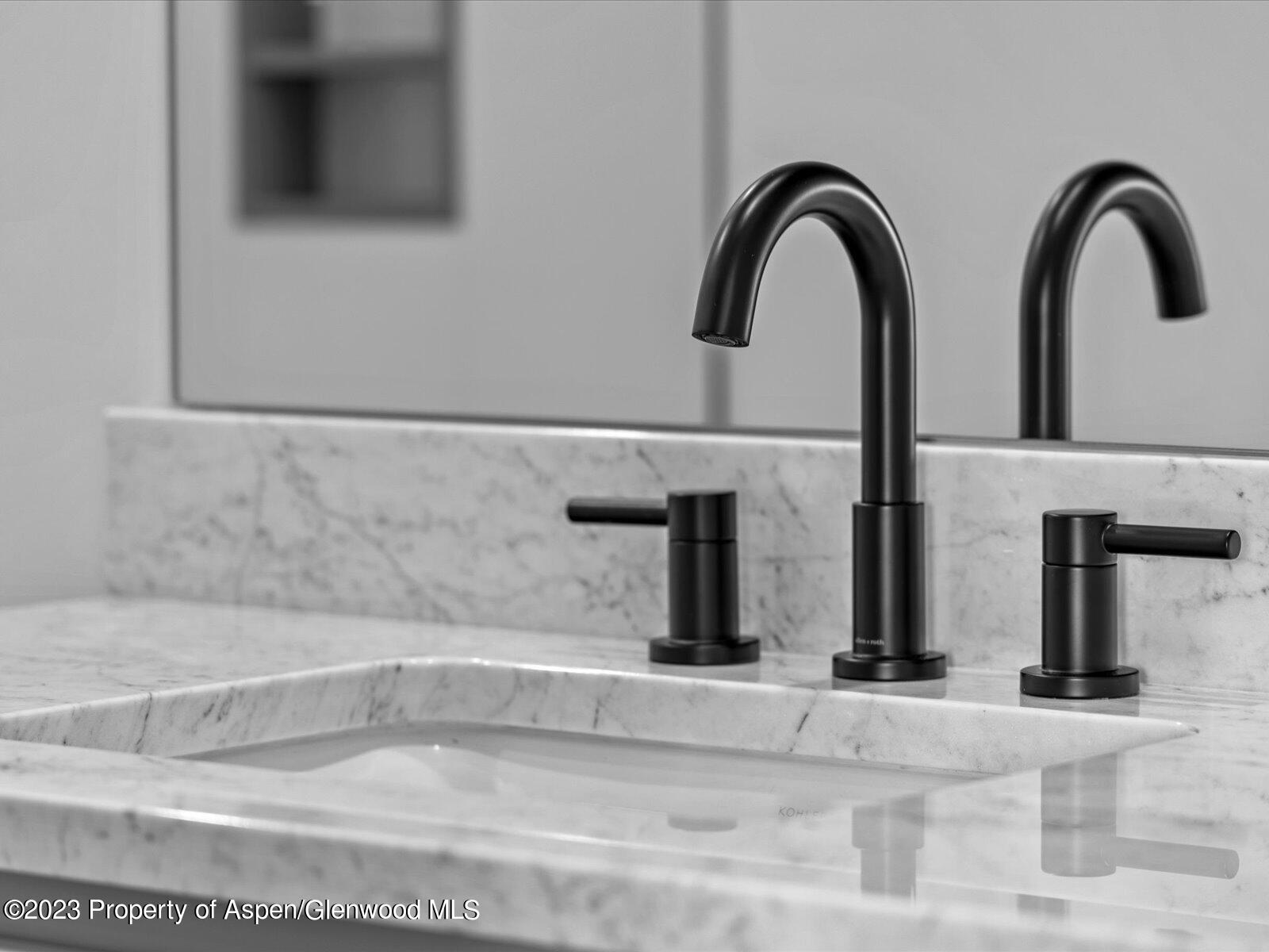 1416 Rifle Heights Drive Rifle, CO 81650 - Photo 31 of 35 a close view of sink and tap