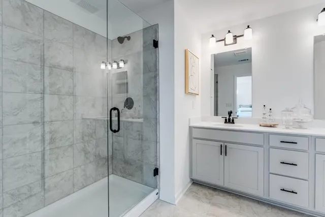 a roof deck with table and chairs potted plants