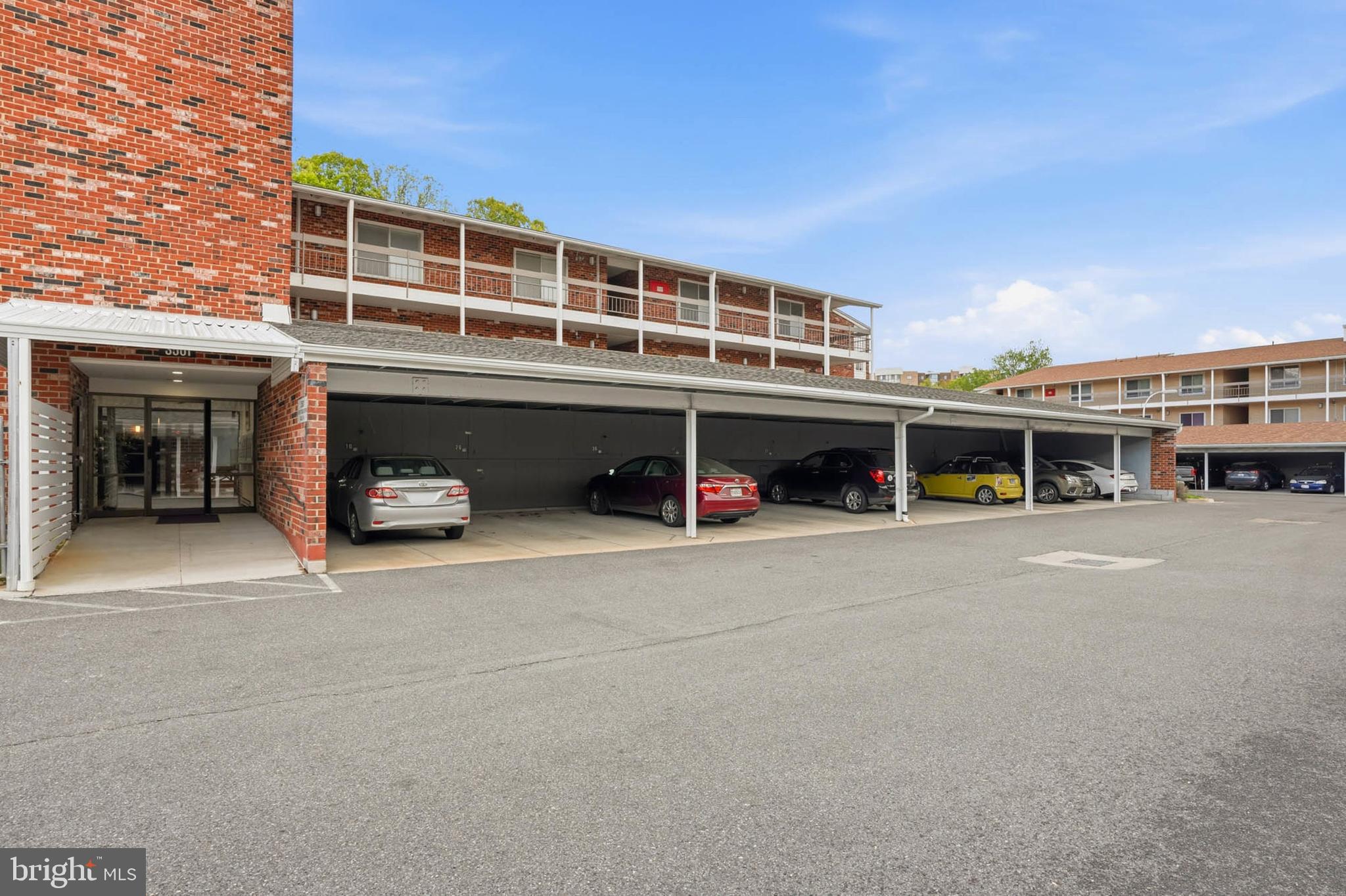 3501 Forest Edge Drive, Unit 142G Silver Spring, MD 20906 - Photo 29 of 30 a view of a big building with many windows