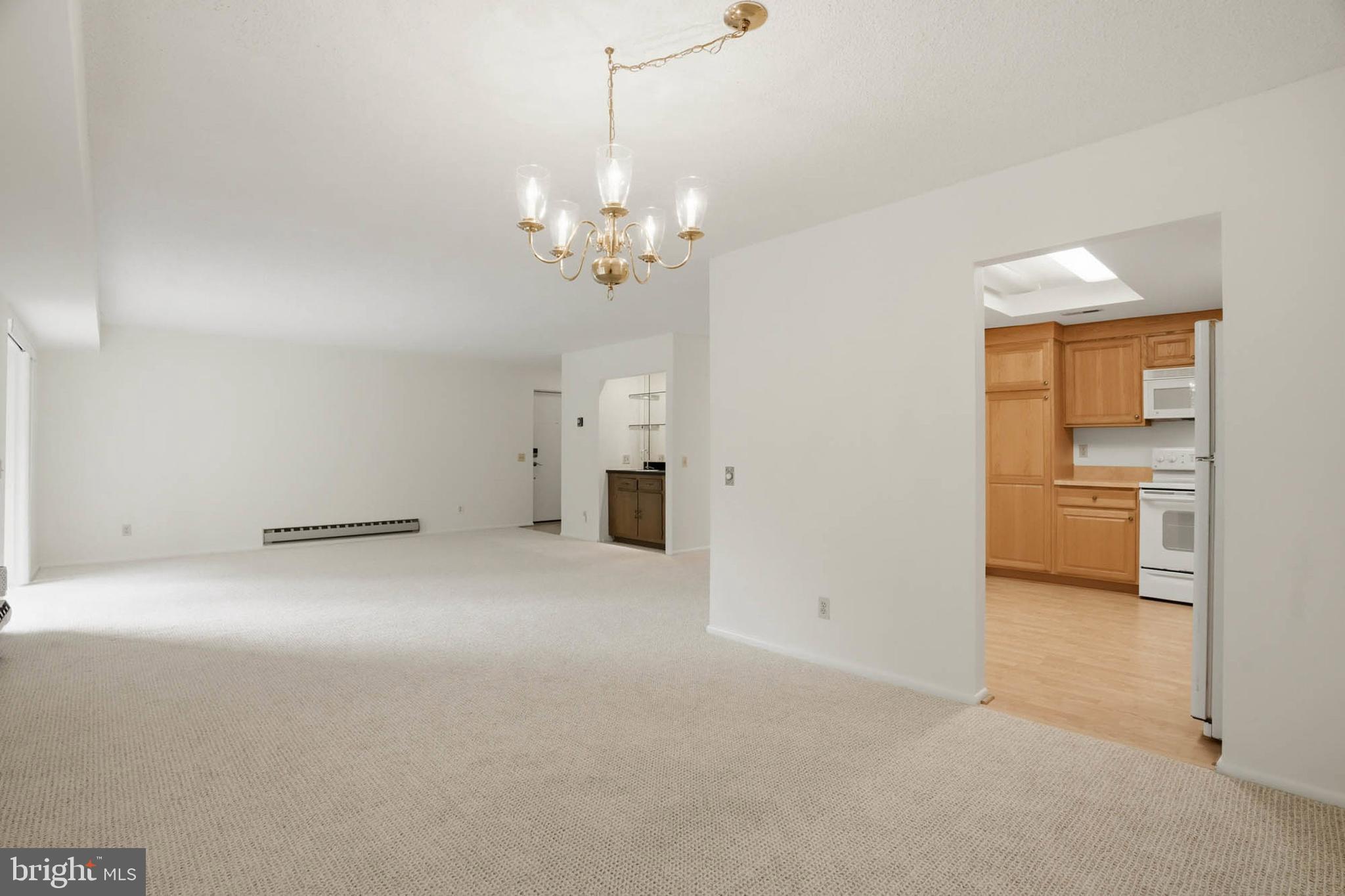 3501 Forest Edge Drive, Unit 142G Silver Spring, MD 20906 - Photo 10 of 30 a view of a kitchen with a sink and dishwasher