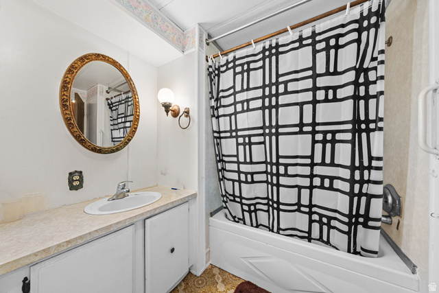 49 600 North Hurricane, UT 84737 - Photo 11 of 33 Bathroom with vanity and shower / bath combo with shower curtain