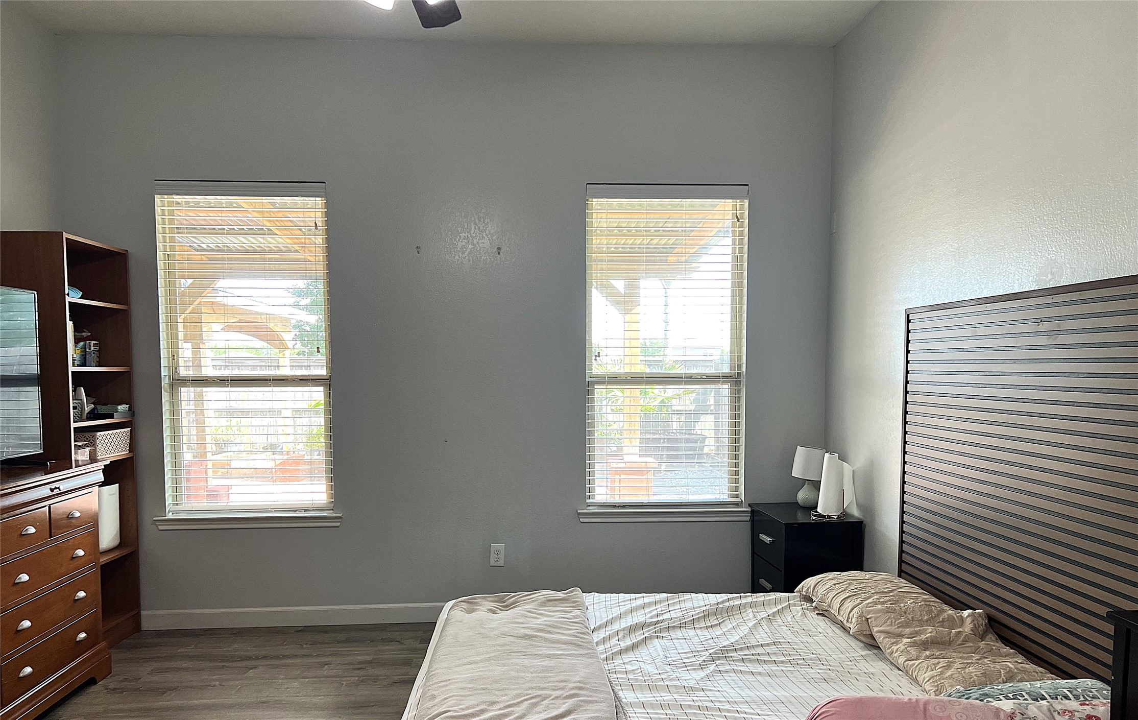 9111 Fuqua Ridge Lane Houston, TX 77075 - Photo 11 of 21 a bedroom with a bed and a window