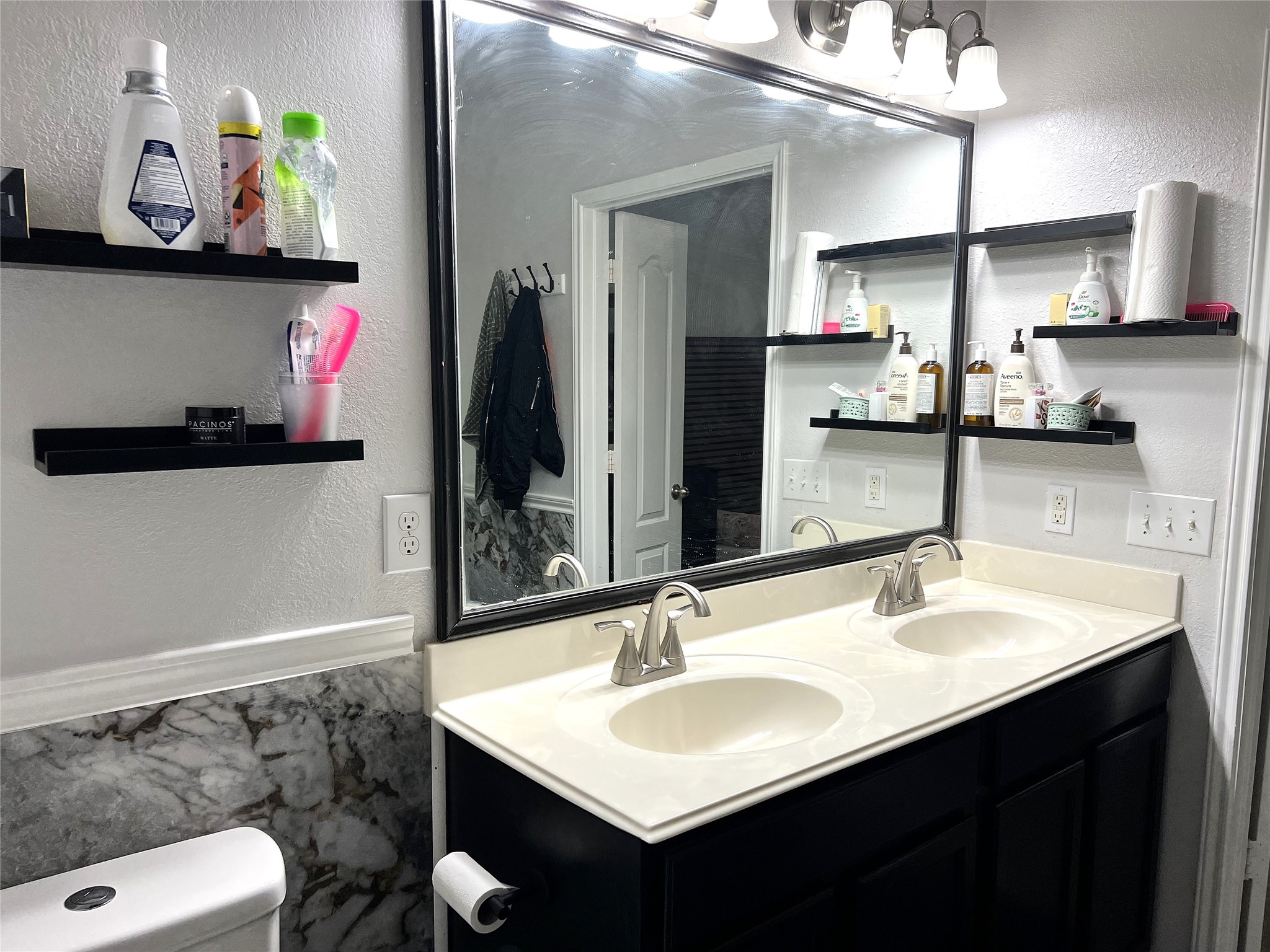 9111 Fuqua Ridge Lane Houston, TX 77075 - Photo 12 of 21 a bathroom with a sink vanity and a mirror