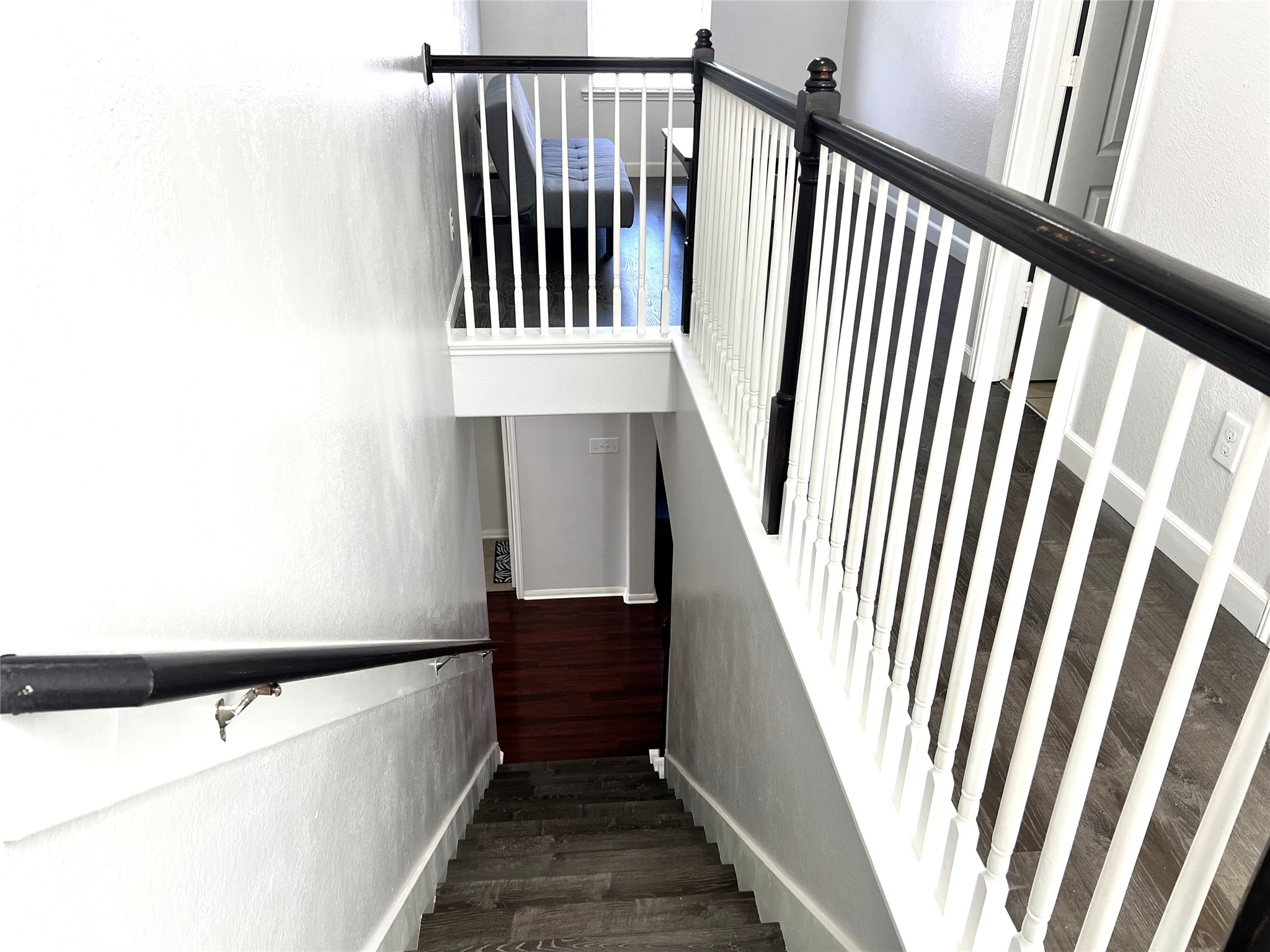 9111 Fuqua Ridge Lane Houston, TX 77075 - Photo 15 of 21 a view of staircase with railing and white walls