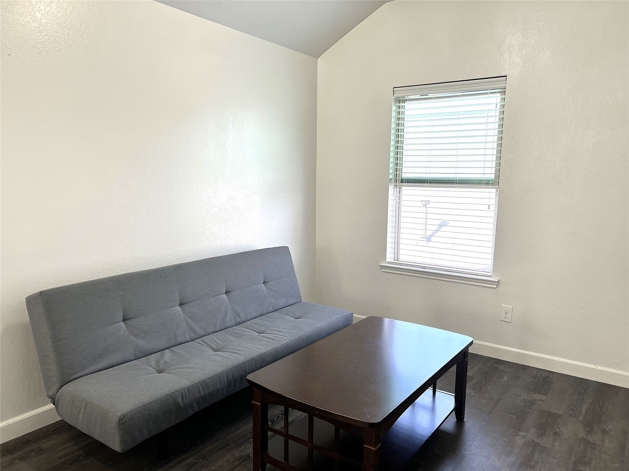 9111 Fuqua Ridge Lane Houston, TX 77075 - Photo 17 of 21 a living room with furniture and a window