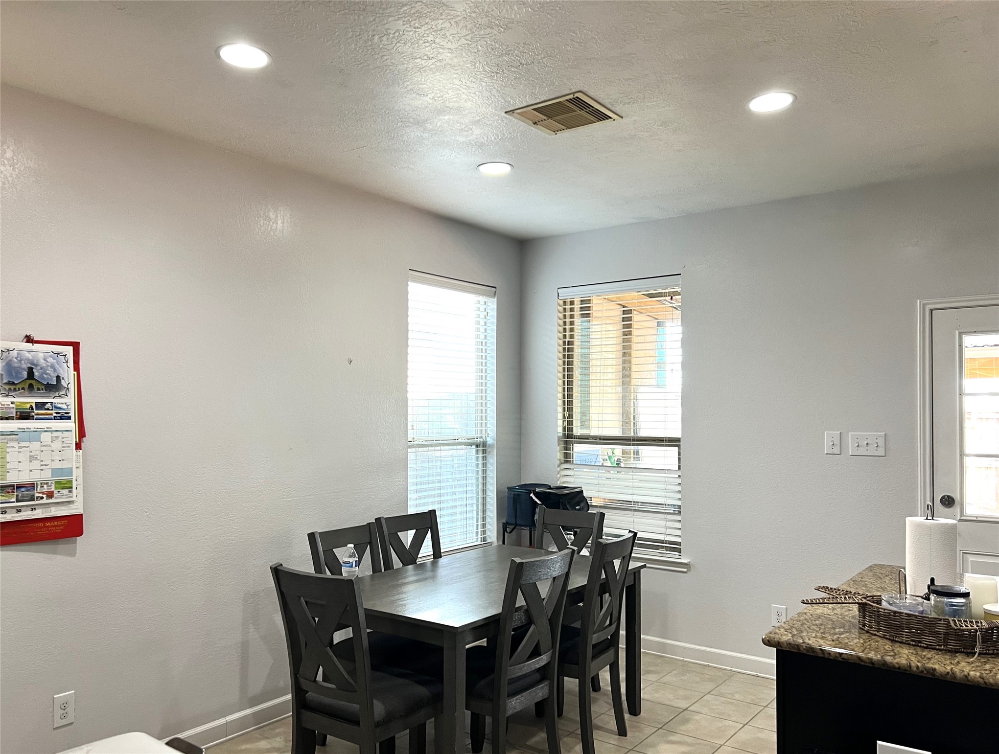 9111 Fuqua Ridge Lane Houston, TX 77075 - Photo 10 of 21 a view of a dining room with furniture and window