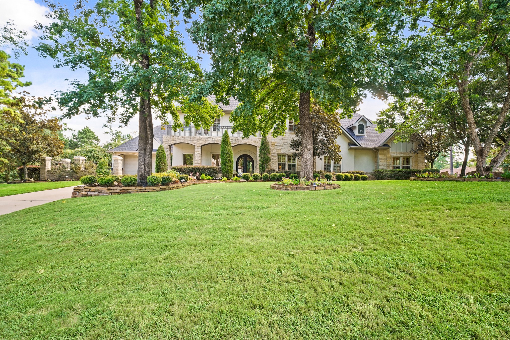 Welcome to 6702 Star Ledge Court, nestled in the exclusive, gated community of Sterling Ridge.