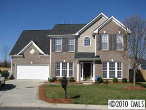 5931 Summer Fog End Fort Mill, SC 29708 - Photo 1 of 8 a front view of a house with a yard