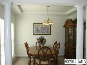 5931 Summer Fog End Fort Mill, SC 29708 - Photo 2 of 8 a view of a dining room with furniture and chandelier