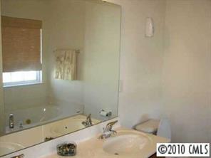 5931 Summer Fog End Fort Mill, SC 29708 - Photo 6 of 8 a bathroom with a sink and a bathtub