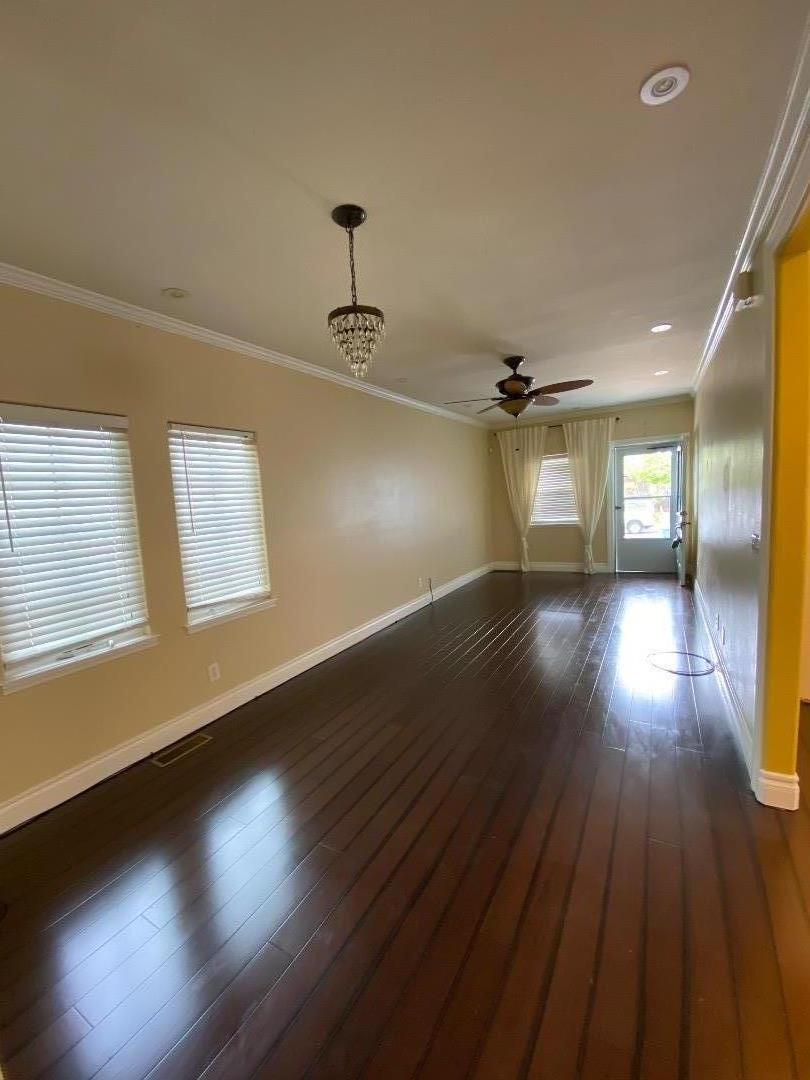 348 Garretson Avenue Rodeo, CA 94572 - Photo 3 of 9 a view of empty room with wooden floor and fan