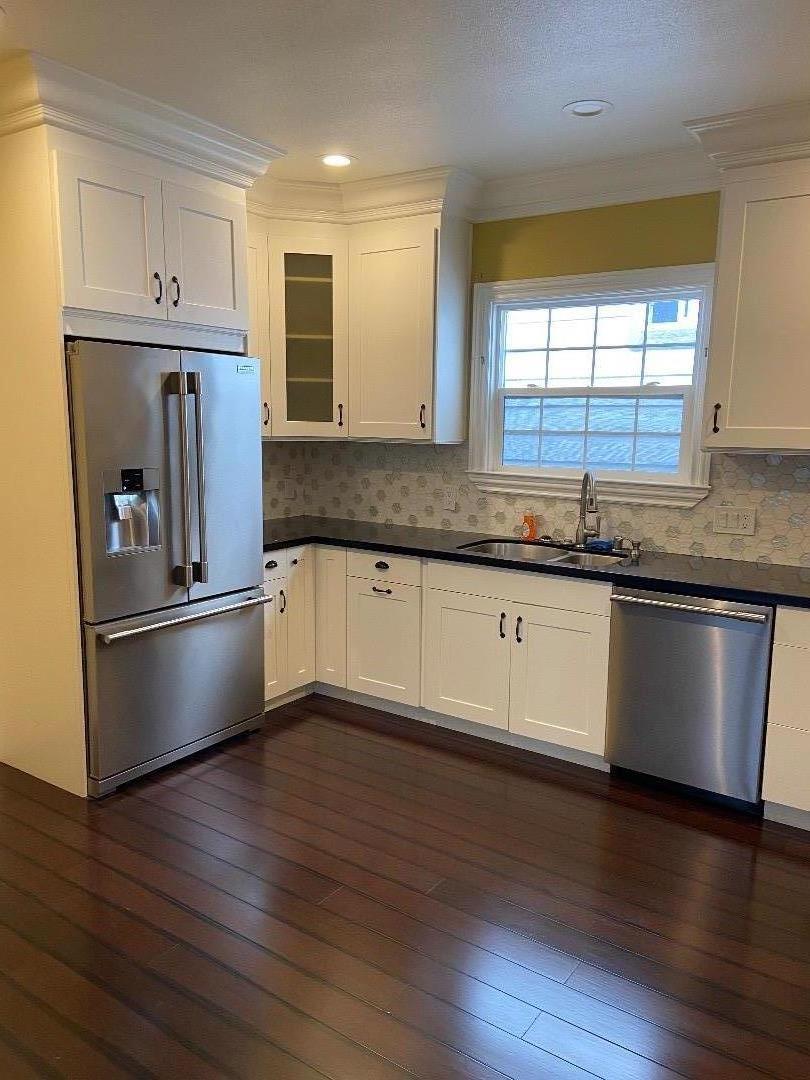 348 Garretson Avenue Rodeo, CA 94572 - Photo 5 of 9 a large kitchen with granite countertop a stove and a sink
