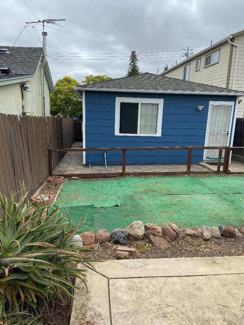 348 Garretson Avenue Rodeo, CA 94572 - Photo 8 of 9 a front view of a house with a garden