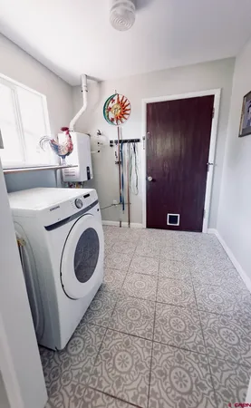 a view of kitchen and a window