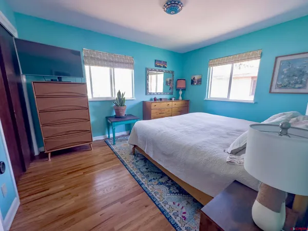 a bathroom with a sink a mirror and a bathtub