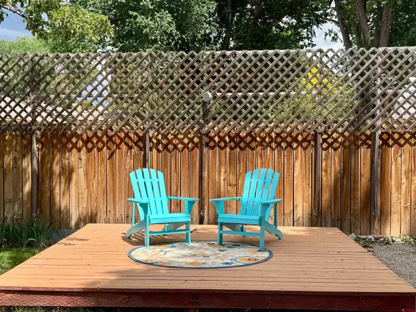 swimming pool view with a seating space