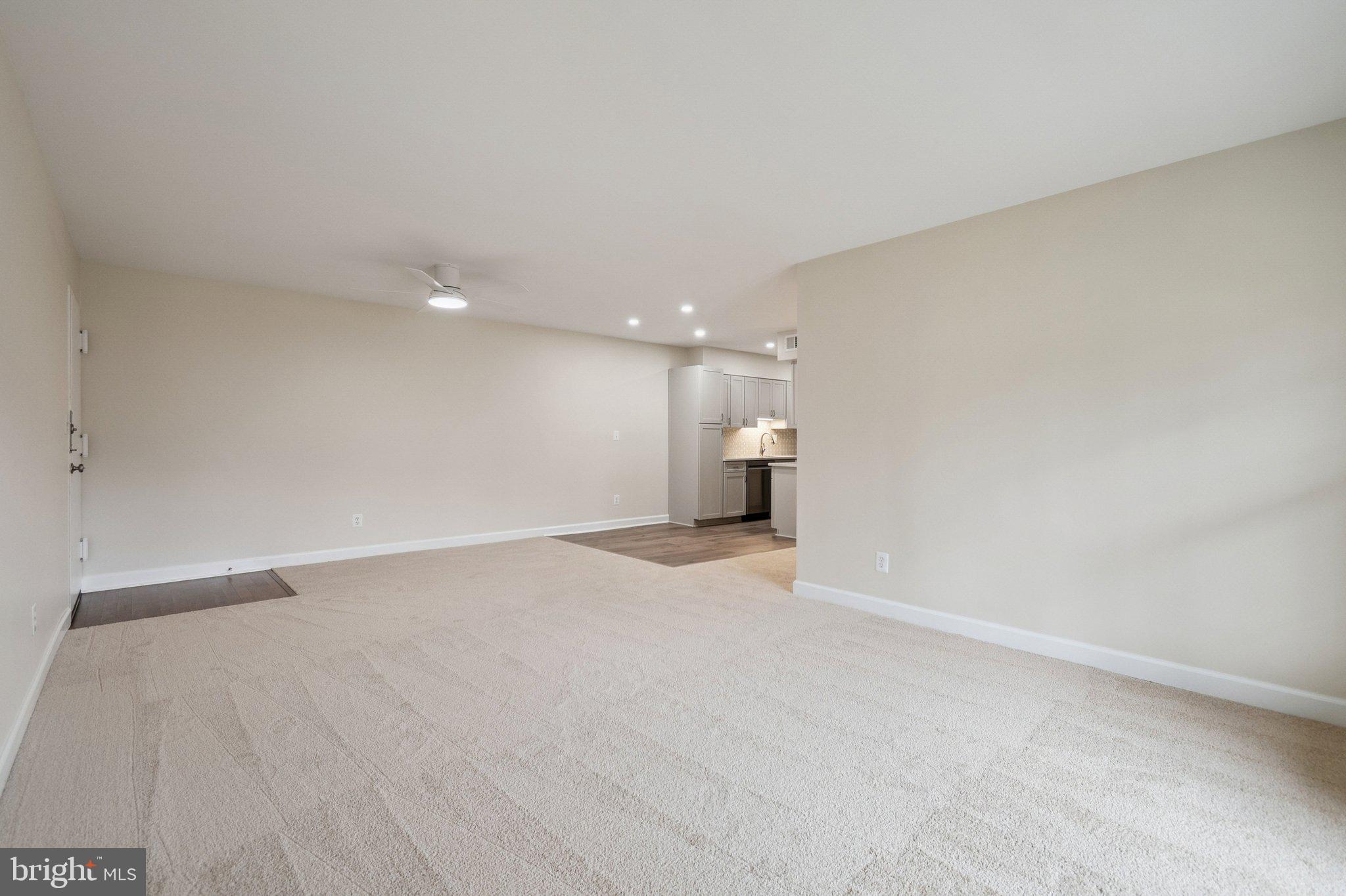 8312 Kingsgate Road, Unit 532 Springfield, VA 22152 - Photo 13 of 51 Living room adjoins dining area
