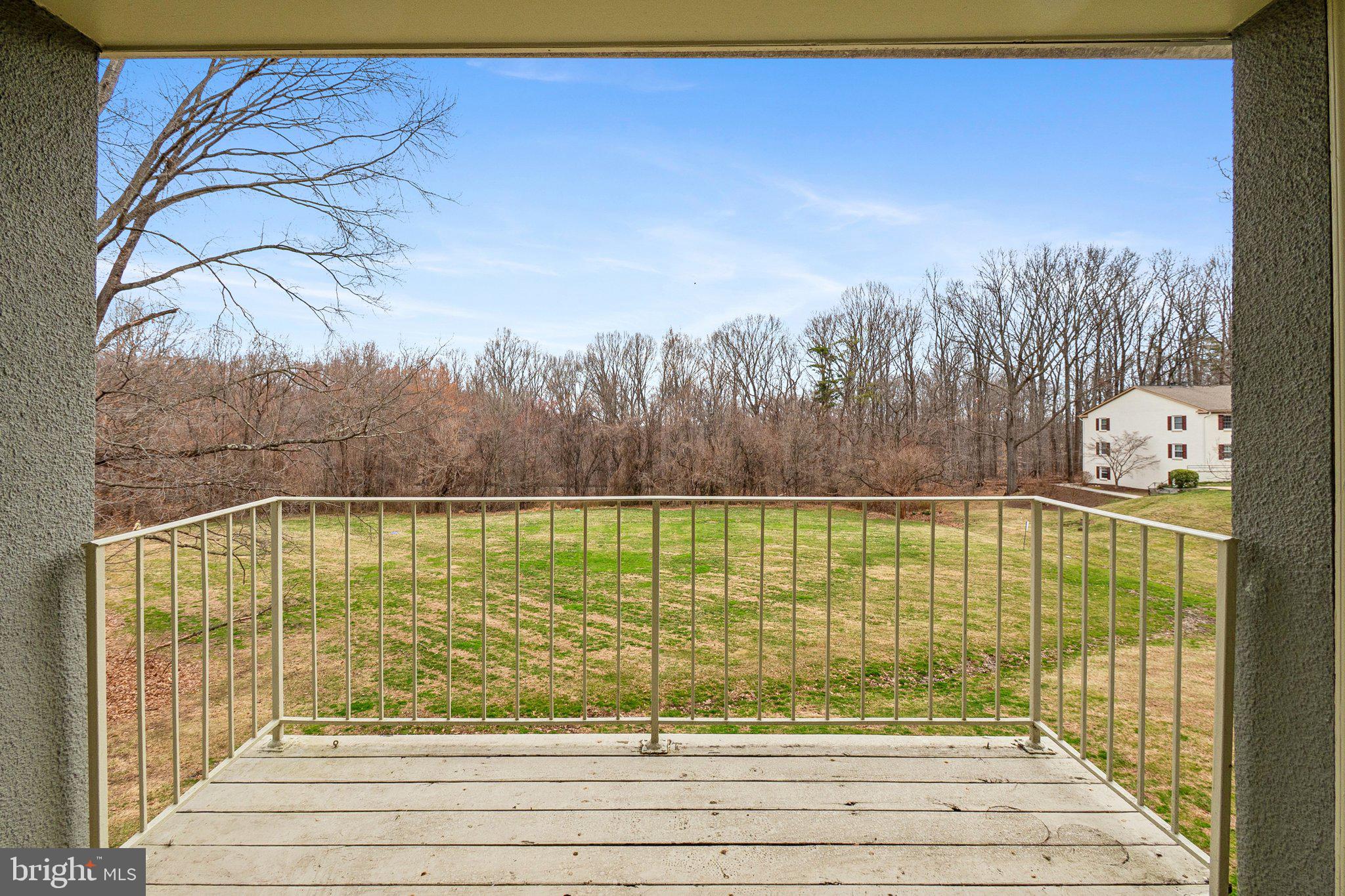8312 Kingsgate Road, Unit 532 Springfield, VA 22152 - Photo 36 of 51 Balcony overlooks common area & trees