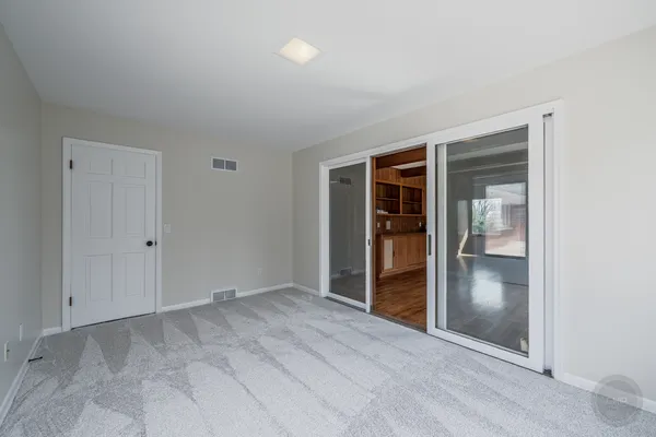 an empty room with windows