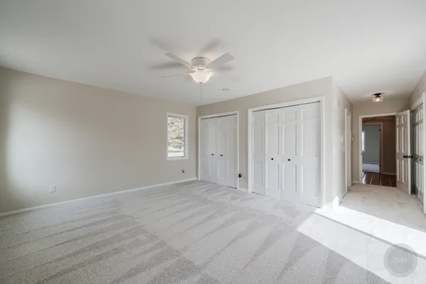 a view of a room with wooden walls