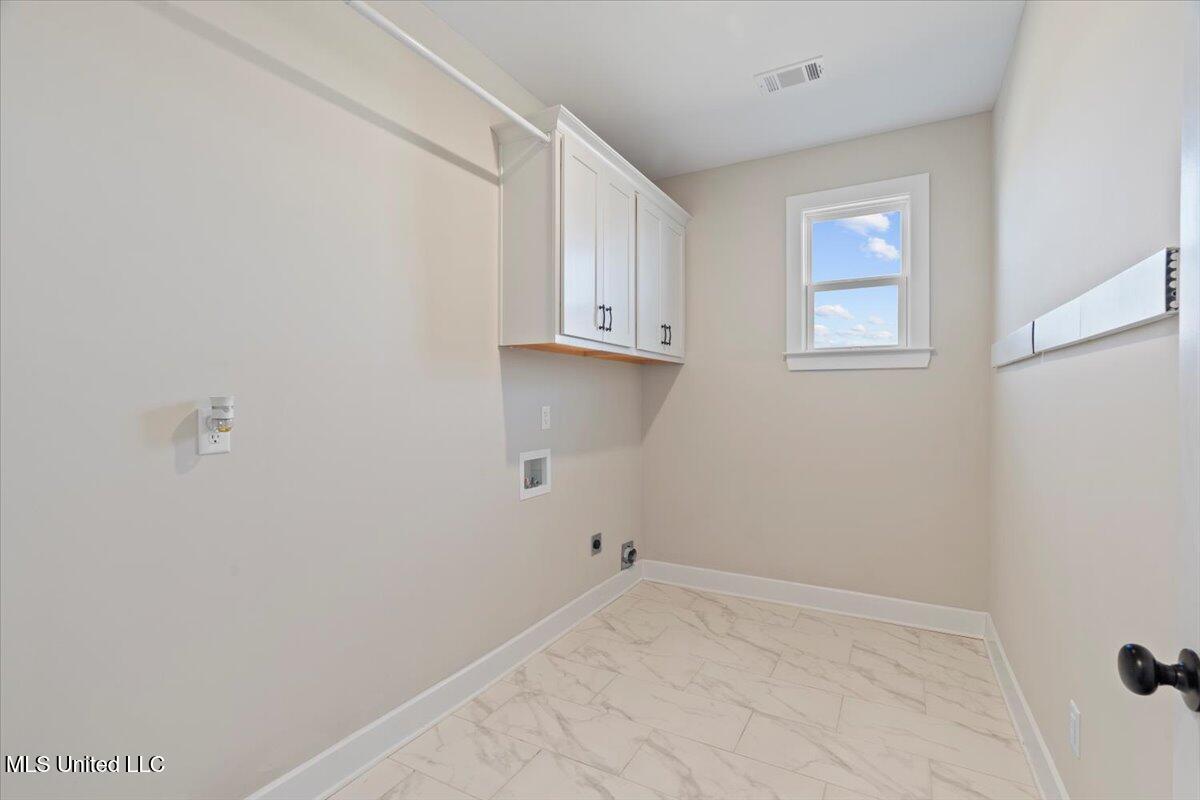 9564 Silo Pk Road Olive Branch, MS 38654 - Photo 21 of 50 Laundry Room