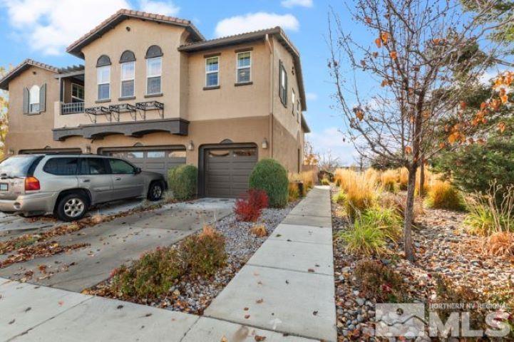 1700 Wind Ranch Road, Unit C Reno, NV 89521 - Photo 1 of 19 a car parked in front of a house