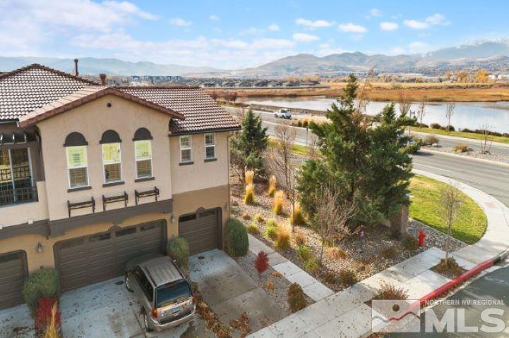 1700 Wind Ranch Road, Unit C Reno, NV 89521 - Photo 2 of 19 a view of a city with lawn chairs