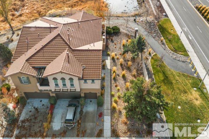 1700 Wind Ranch Road, Unit C Reno, NV 89521 - Photo 4 of 19 an aerial view of a house with a yard