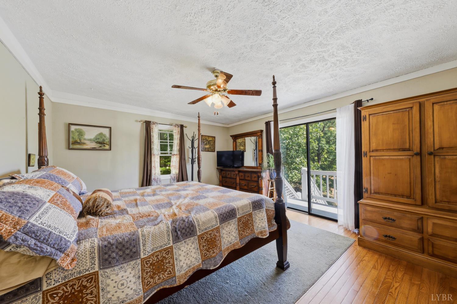 809 Plantation Road Amherst, VA 24521 - Photo 30 of 77 a bedroom with a large bed and a large window