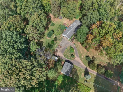 an aerial view of residential house with outdoor space