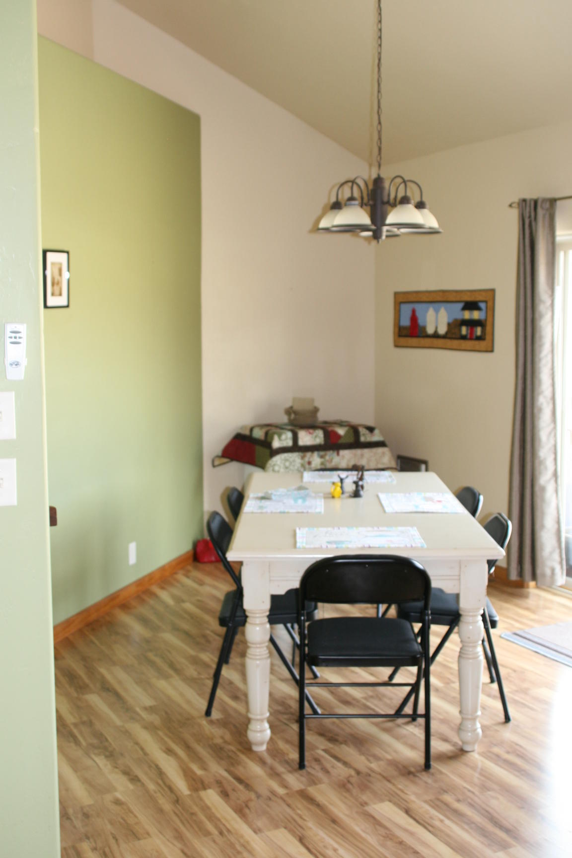 407 Kismet Street, Unit NO # Ridgway, CO 81432 - Photo 21 of 34 a dining room with a table chairs and wooden floor