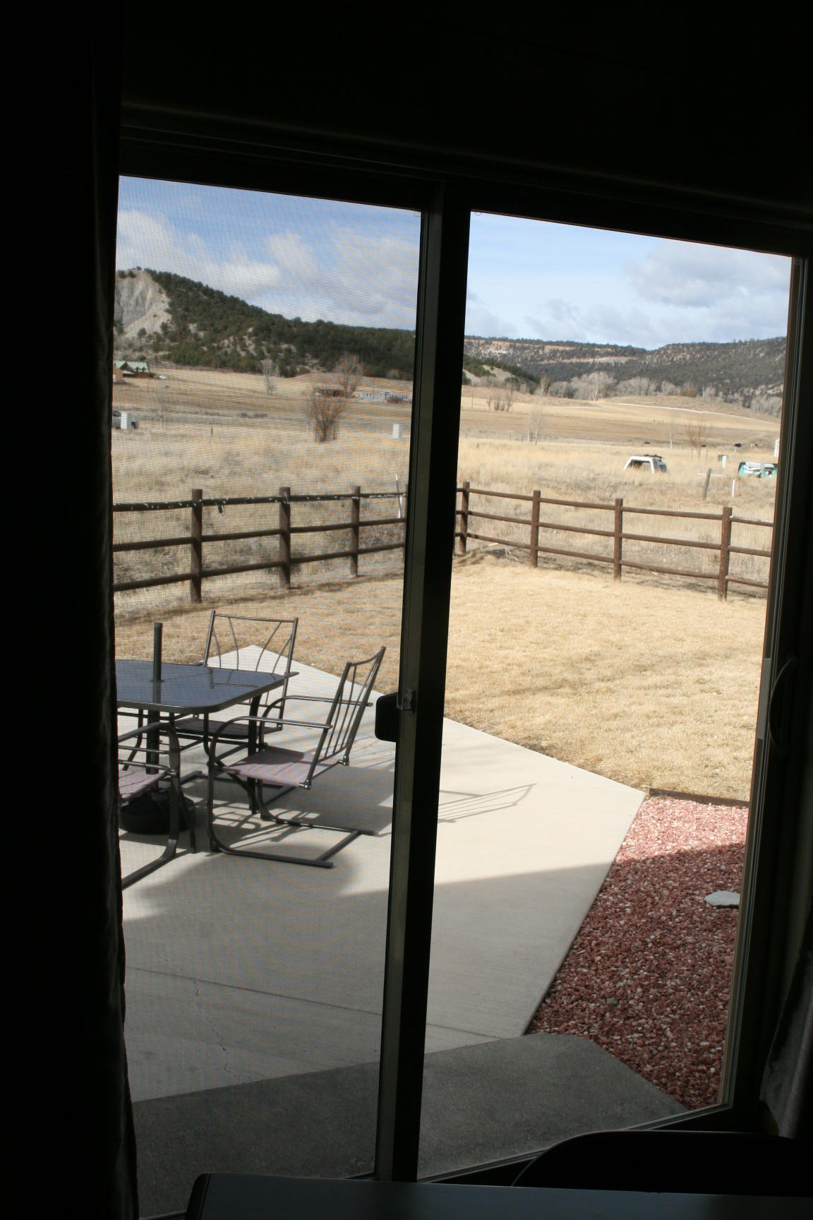 407 Kismet Street, Unit NO # Ridgway, CO 81432 - Photo 25 of 34 a view of a room with a large window