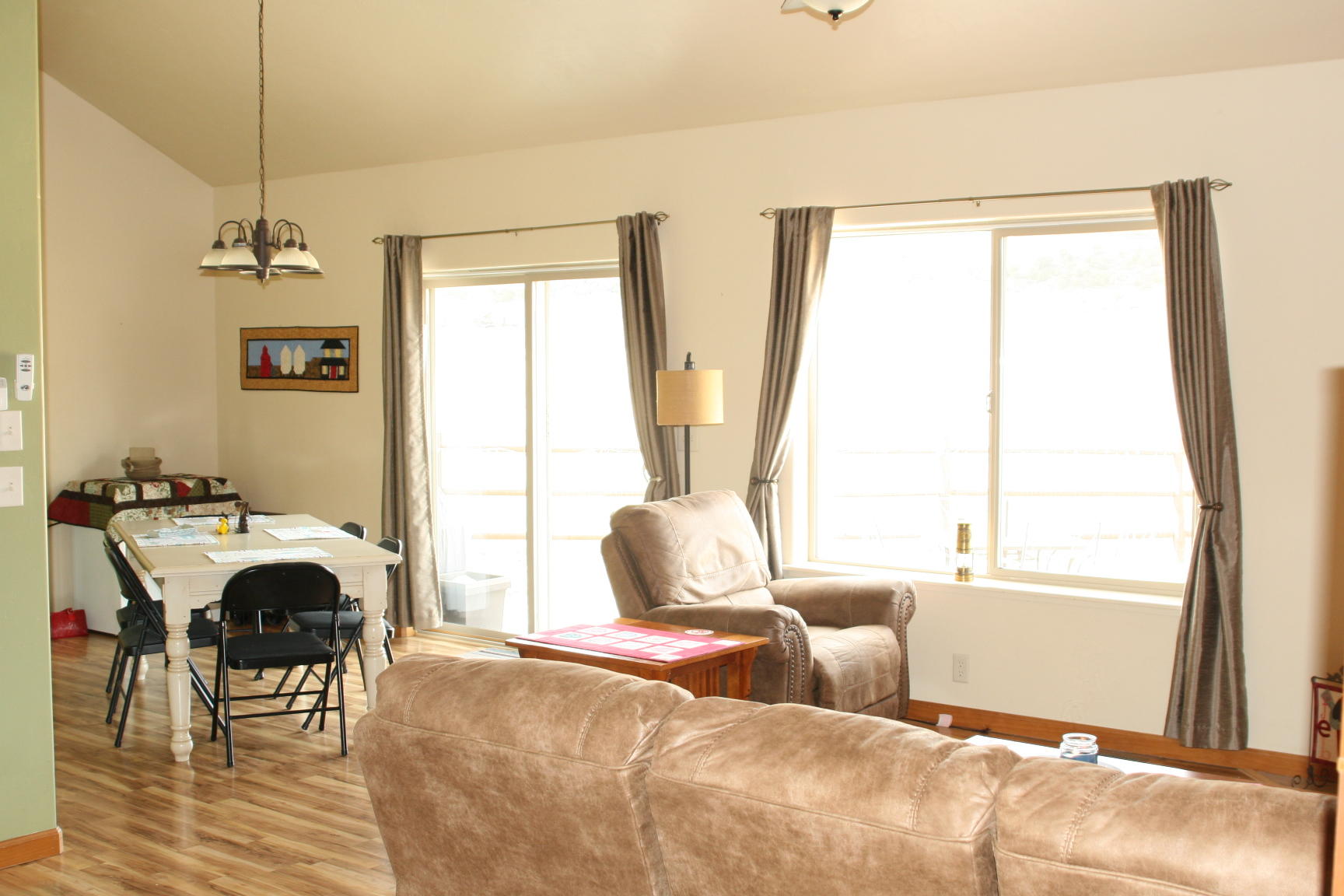407 Kismet Street, Unit NO # Ridgway, CO 81432 - Photo 26 of 34 a bedroom with furniture and a window