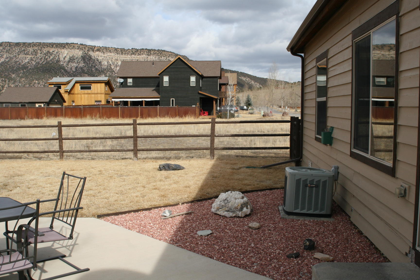 407 Kismet Street, Unit NO # Ridgway, CO 81432 - Photo 32 of 34 a view of a terrace with chairs