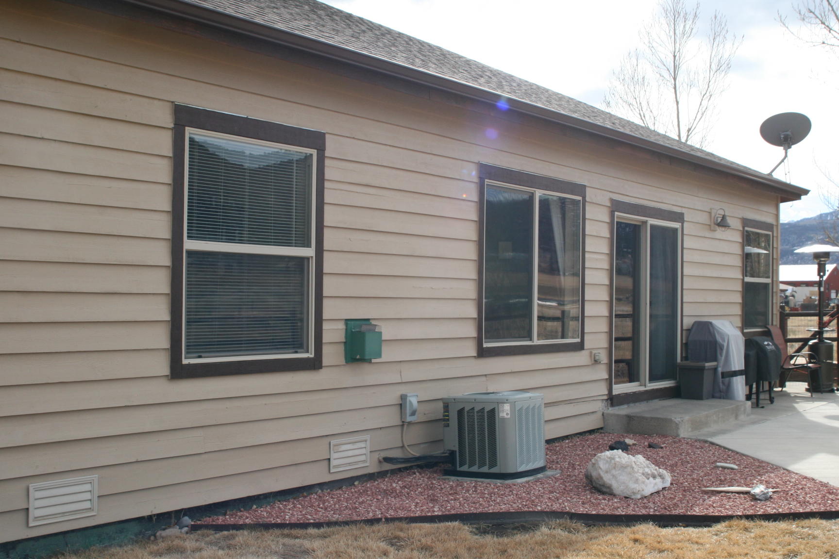 407 Kismet Street, Unit NO # Ridgway, CO 81432 - Photo 34 of 34 a front view of a house with patio