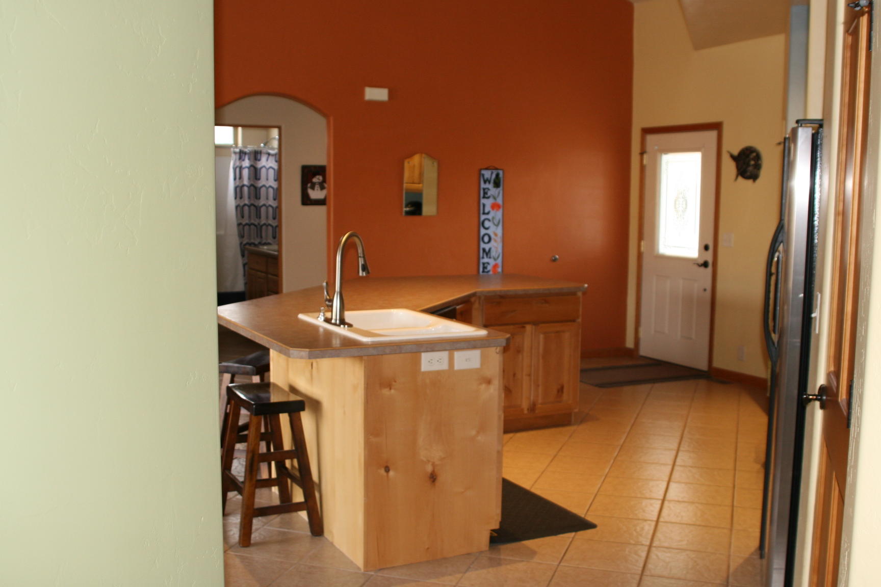 407 Kismet Street, Unit NO # Ridgway, CO 81432 - Photo 5 of 34 a kitchen with a sink cabinets and appliances