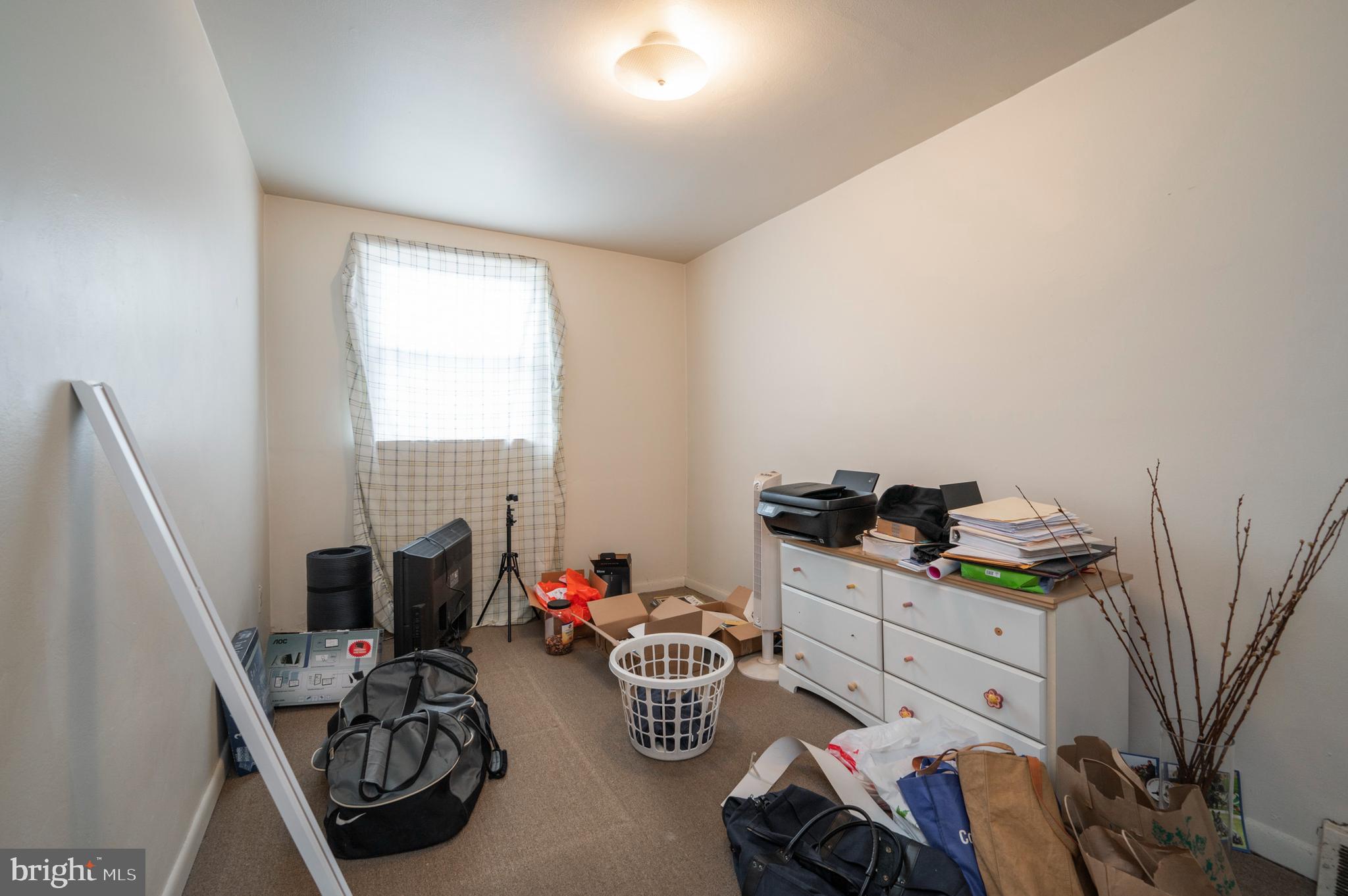 2588 Cranston Road Philadelphia, PA 19131 - Photo 11 of 38 a room with furniture a rug and a window
