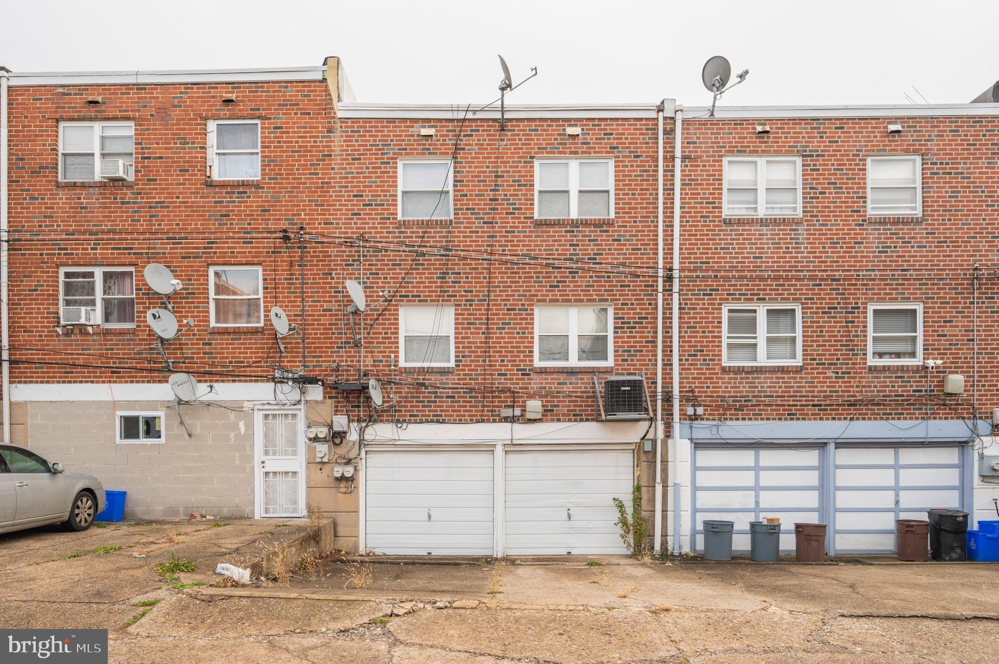 2588 Cranston Road Philadelphia, PA 19131 - Photo 34 of 38 a front view of a building with a parking space